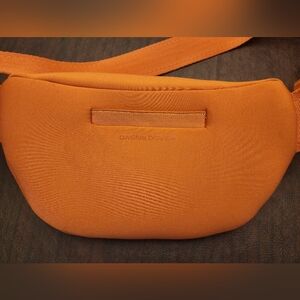 Dagne Dover Orange Crossbody Bag with Minimalist Design